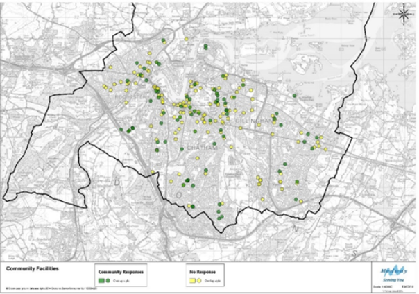 A map of a city with many green and yellow dots indicating various community facilities. 